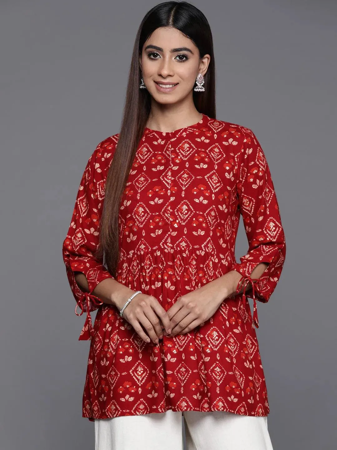 maroon-printed-rayon-a-line-kurti-libas-1-27974460080278_48aa192b-e112-40da-935a-a1e995a7eecd.webp Maroon Printed Rayon A-Line Short Kurti - Image 1
